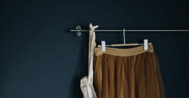 brown skirt hanged on wall